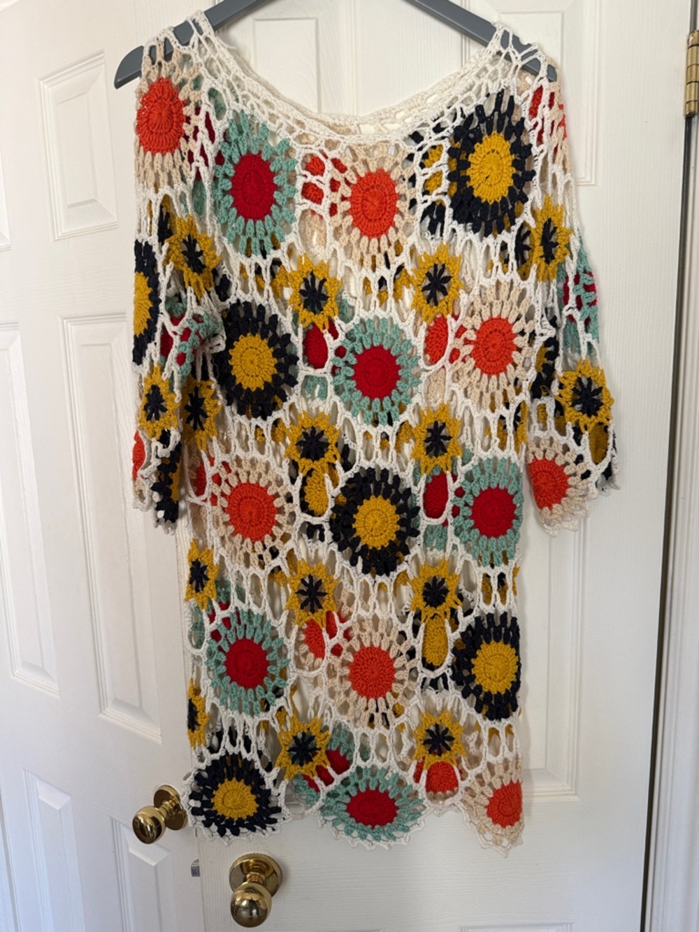 Fun bright crochet tunic.
